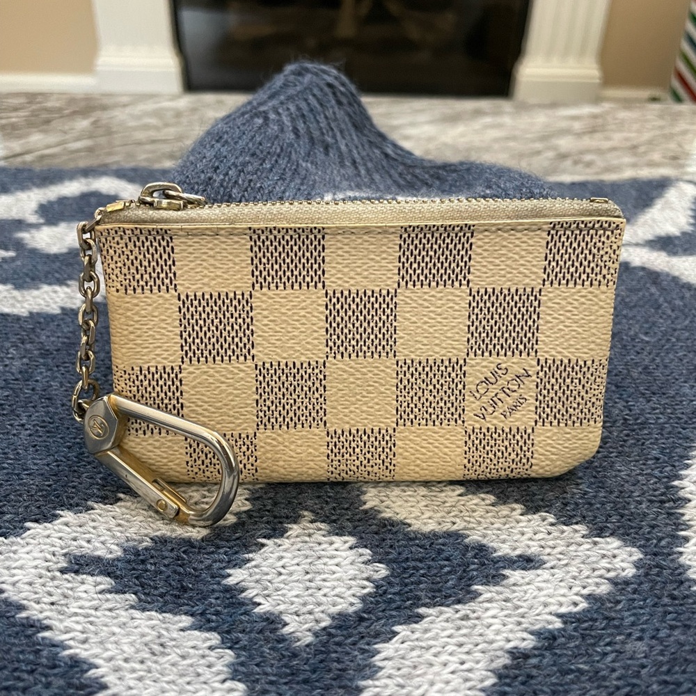 Louis Vuitton Coin wallet.